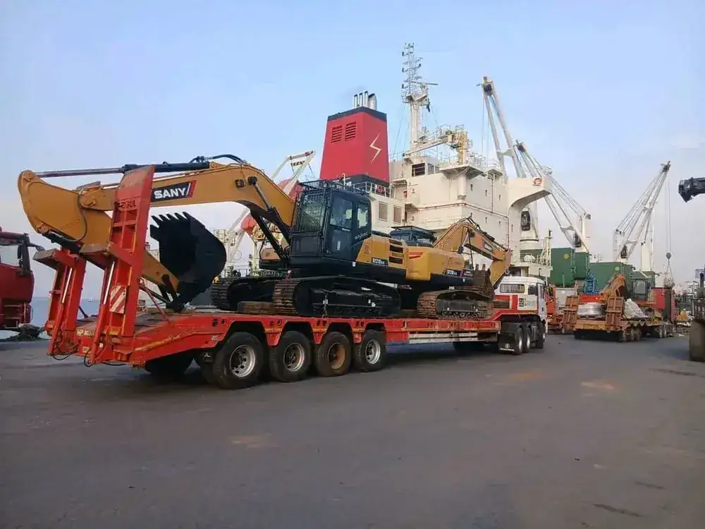 Loading a used excavator for export in China